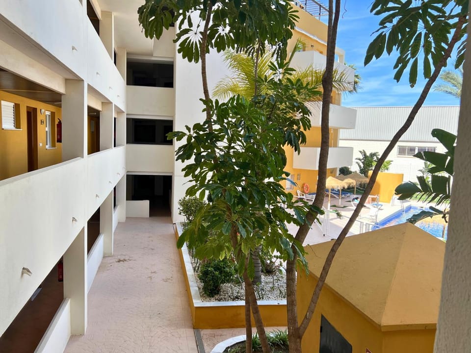 Property building, Patio, Day, View (from property/room), Pool view, Swimming pool