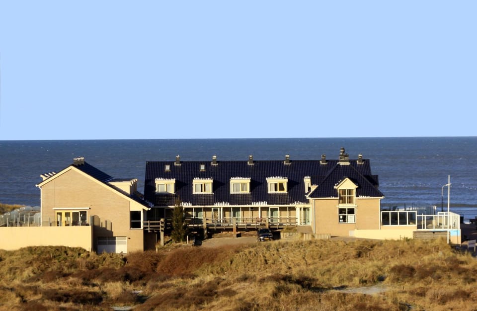 Facade/entrance, Natural landscape, View (from property/room), Beach