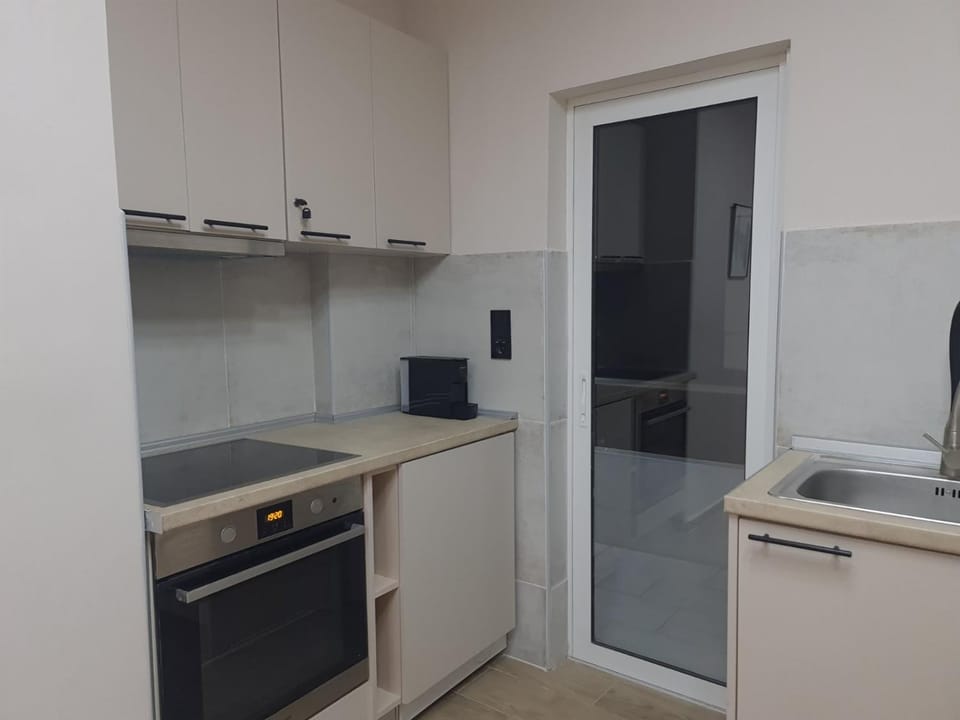Kitchen or kitchenette, oven, stove