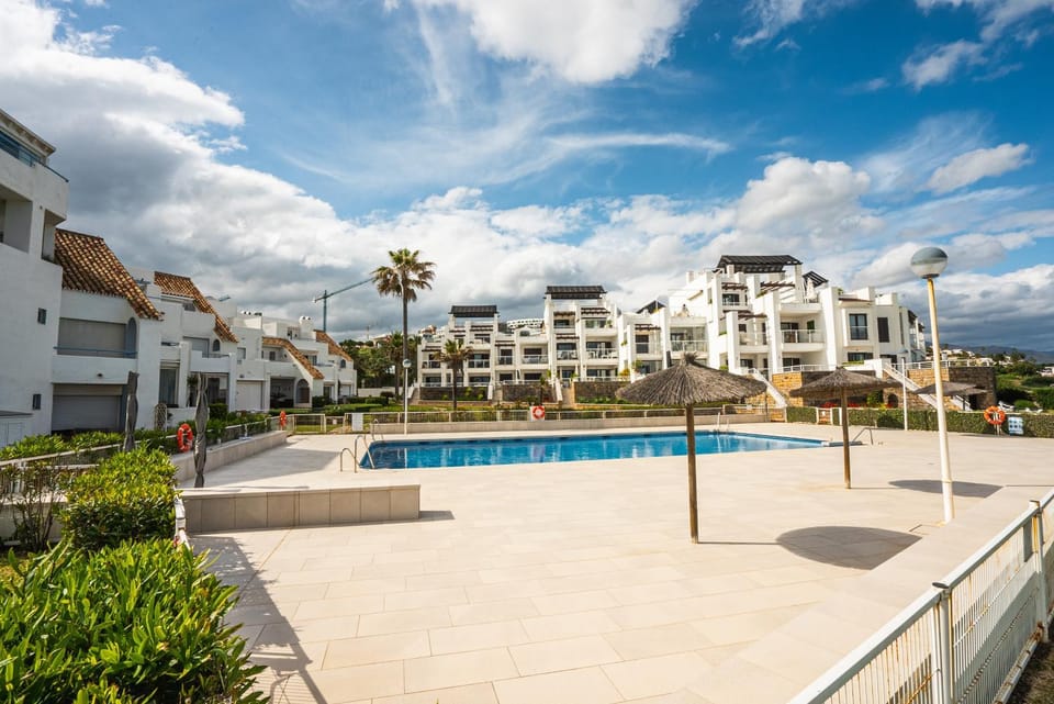 Property building, Day, Pool view, Swimming pool, sunbed