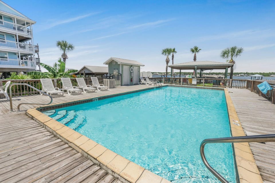 Lagoon Landing 202- Beautifully decorated condo with balcony & pool steps to beach & lagoon House in West Beach
