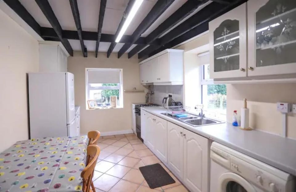 Kitchen or kitchenette, oven, stove, washing machine, kitchen