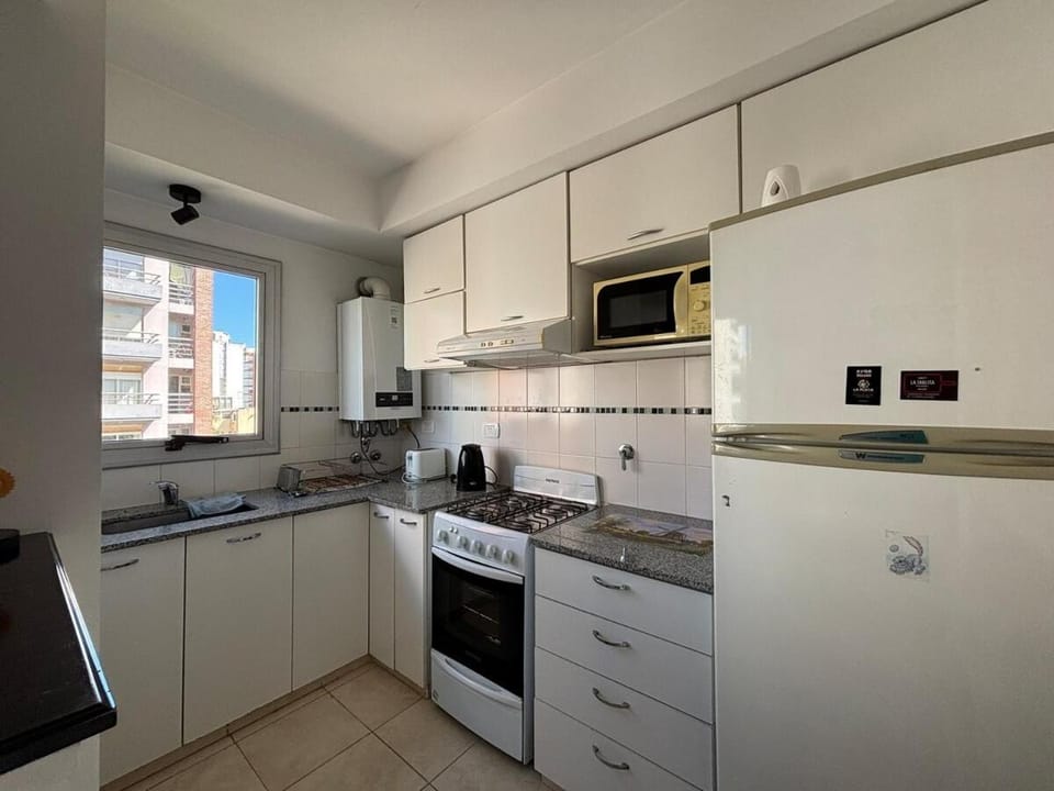Kitchen or kitchenette, oven, stove, toaster