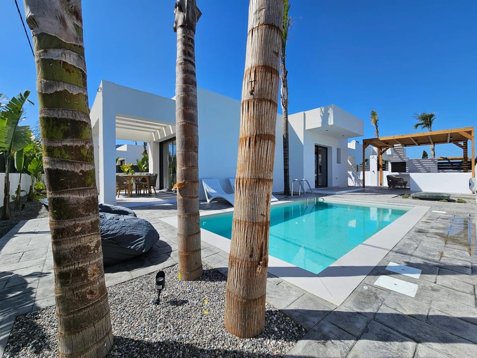 Property building, Pool view, Swimming pool, sunbed