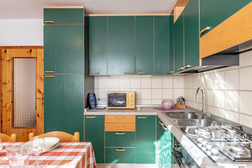 Kitchen or kitchenette, stove