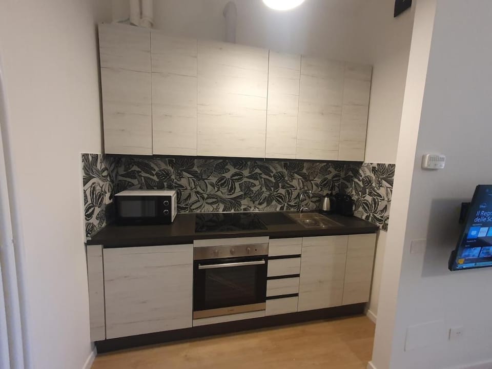 Kitchen or kitchenette, oven, stove