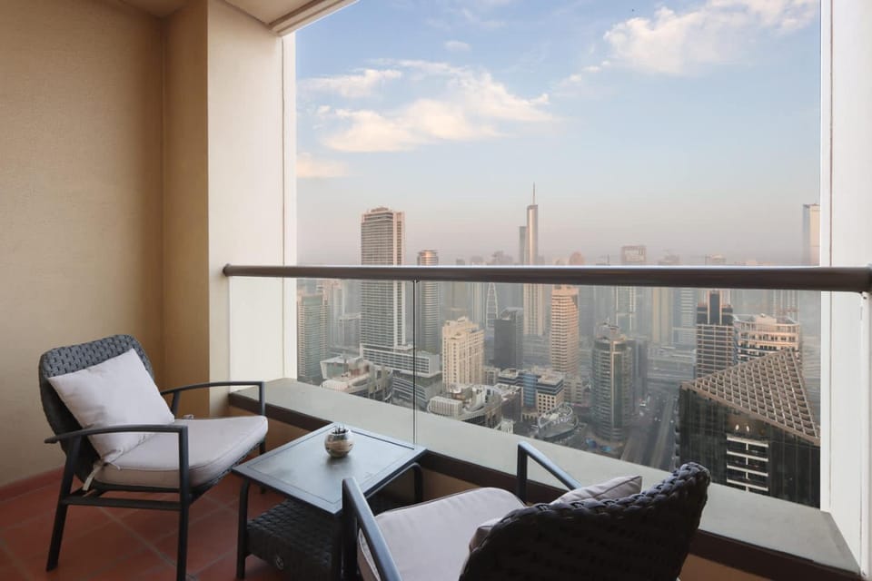View (from property/room), Balcony/Terrace, Seating area, City view
