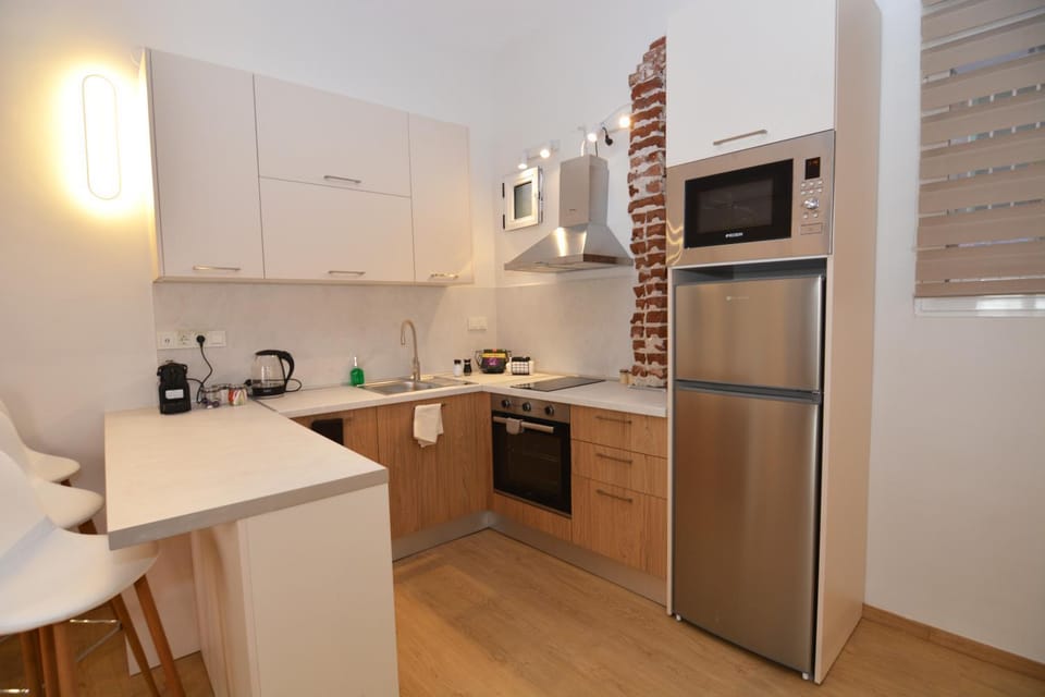 Kitchen or kitchenette, stove