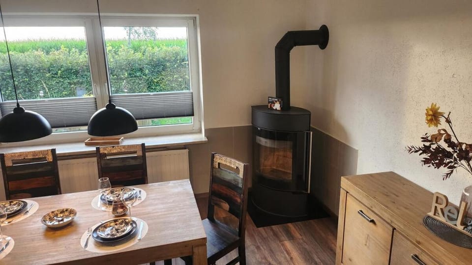 Dining area, fireplace, oven