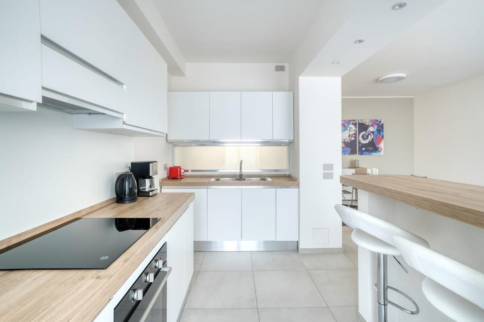 Seating area, dishwasher, oven, stove