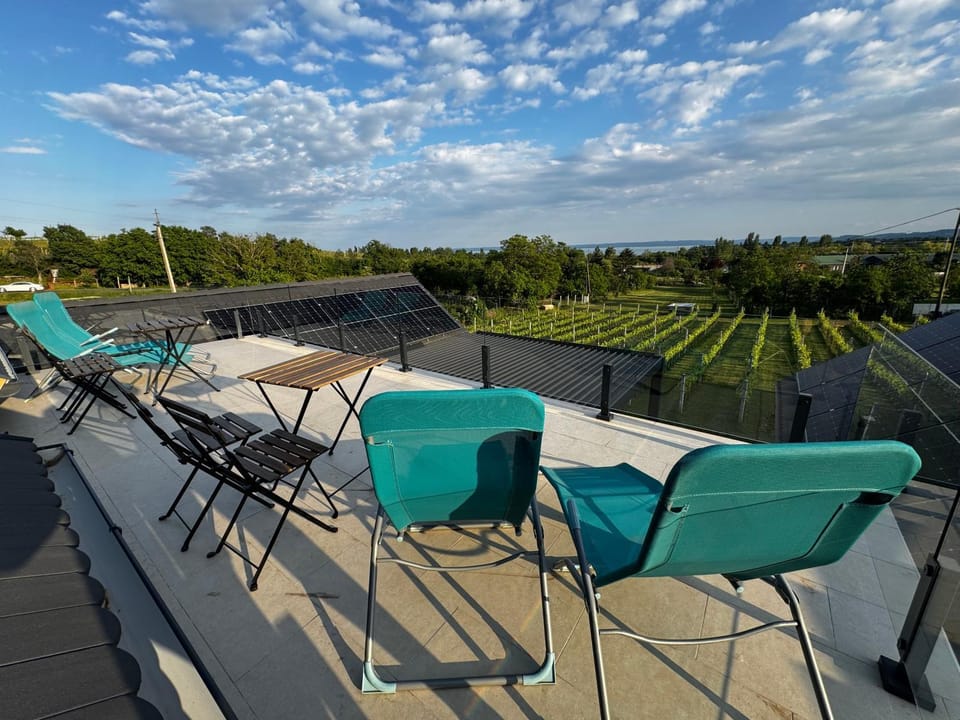 Property building, Patio, Natural landscape, View (from property/room), Balcony/Terrace, sunbed