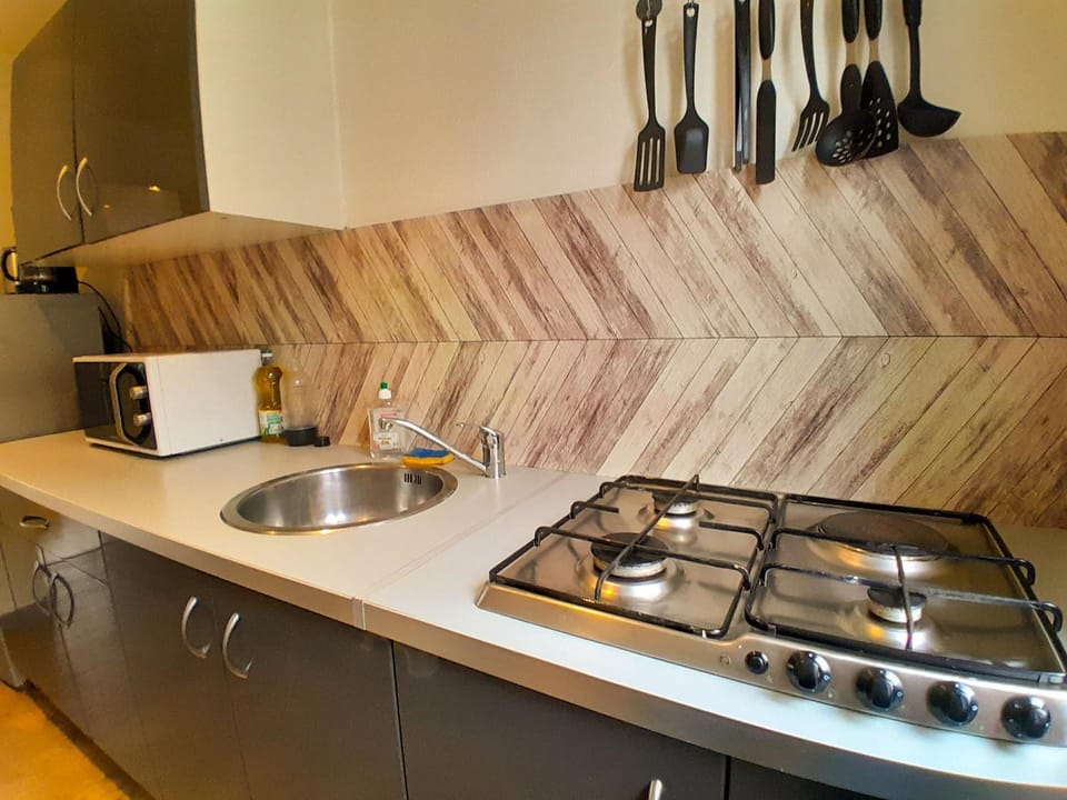 Kitchen or kitchenette, microwave