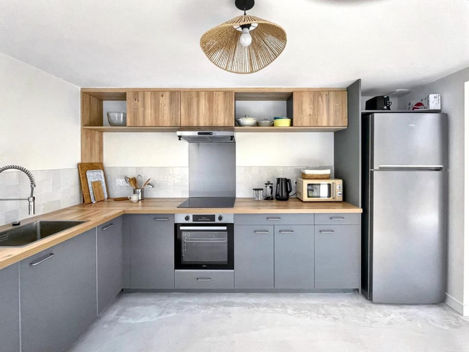 Kitchen or kitchenette, dishwasher, oven, stove, toaster