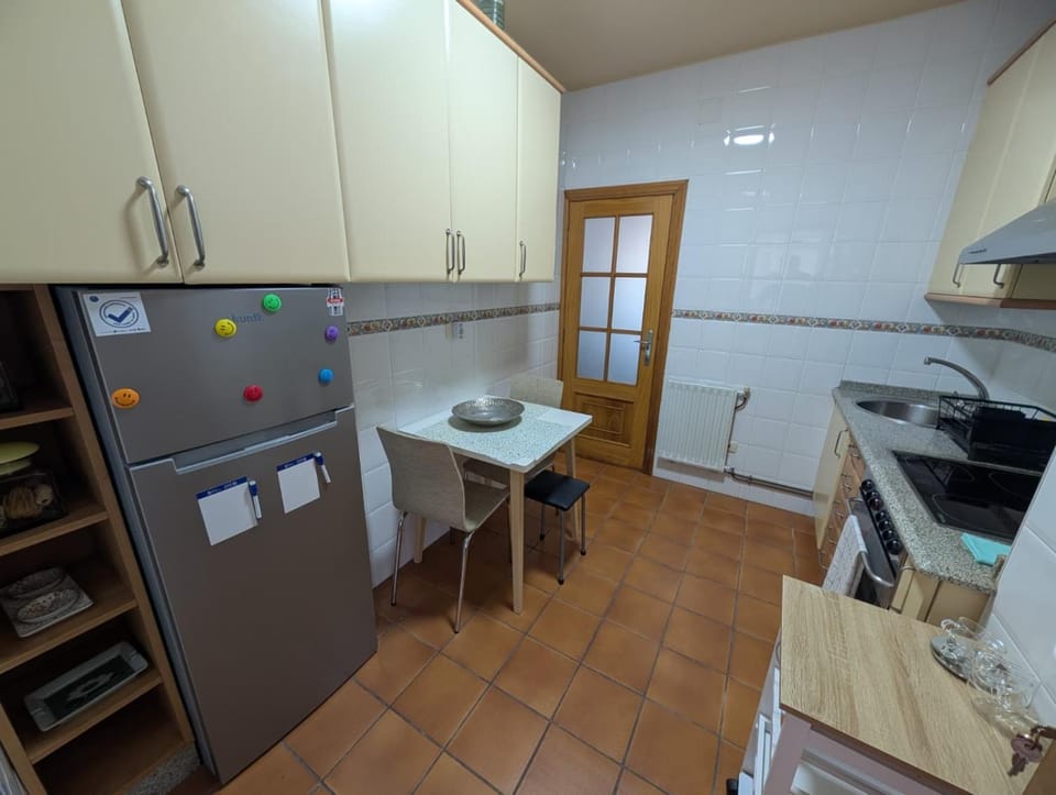 Kitchen or kitchenette, microwave, oven, stove