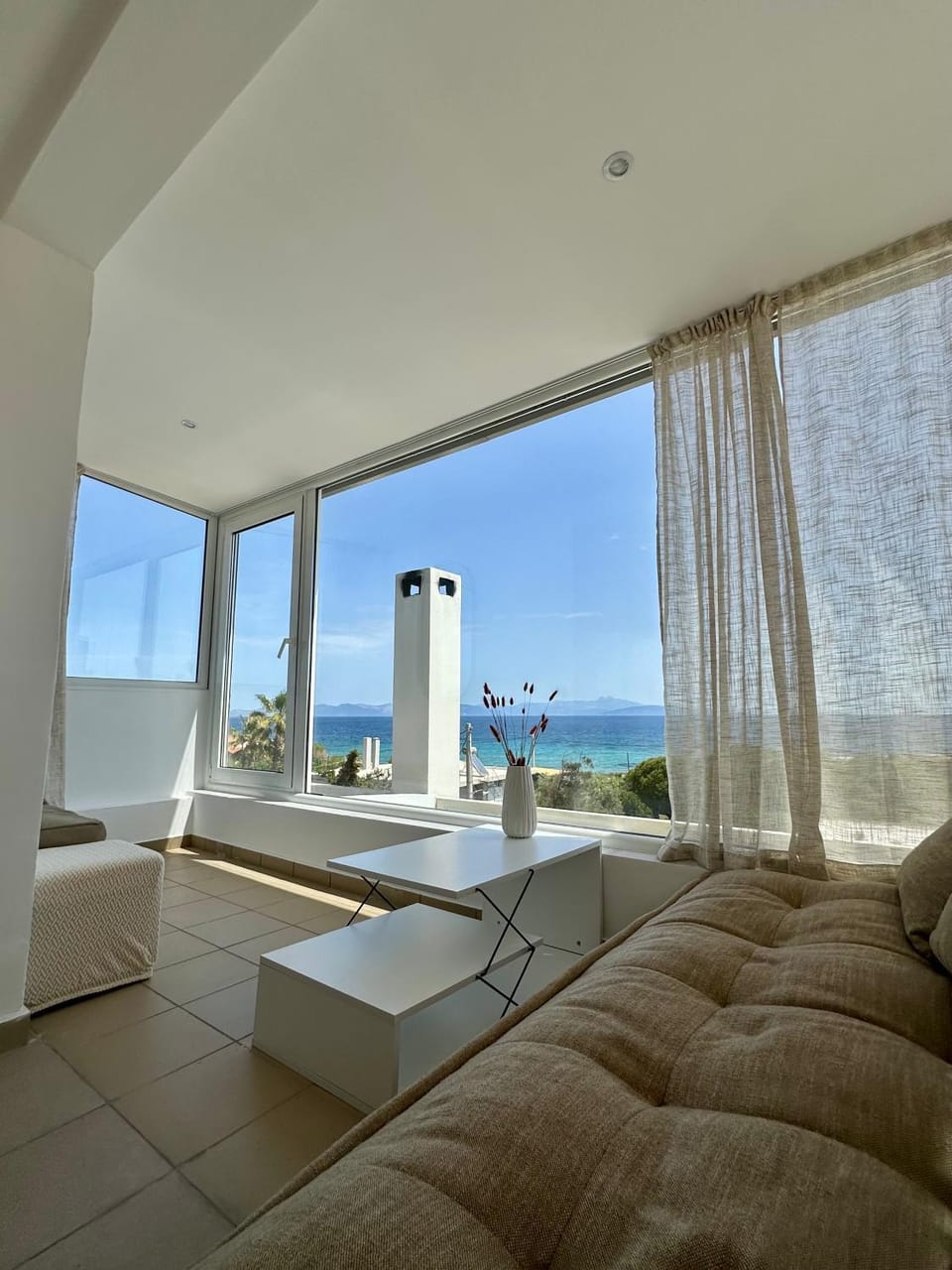View (from property/room), Living room, Seating area, Sea view