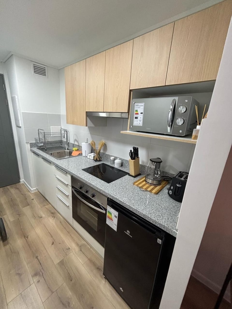 Kitchen or kitchenette, oven, stove, toaster