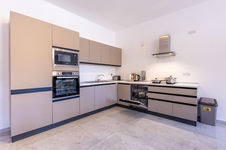 Kitchen or kitchenette, dishwasher, oven, stove, toaster