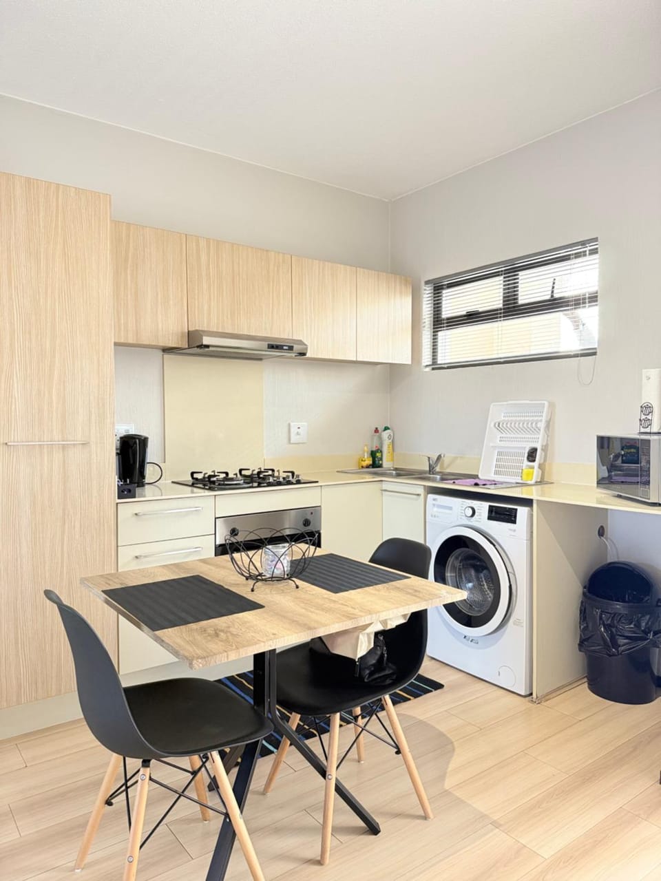 Kitchen or kitchenette, stove, washing machine