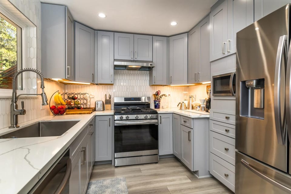 Kitchen or kitchenette, dishwasher, oven, stove, toaster