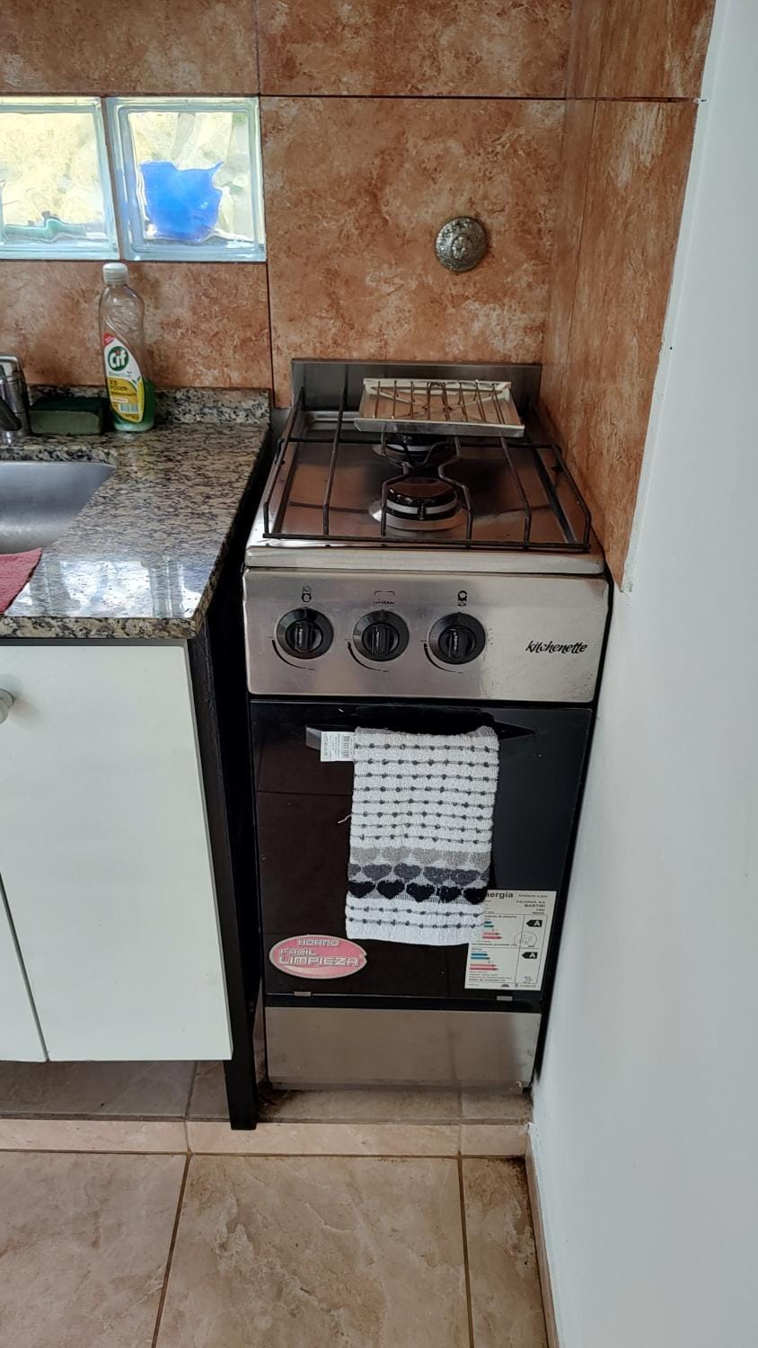 Kitchen or kitchenette, oven, stove