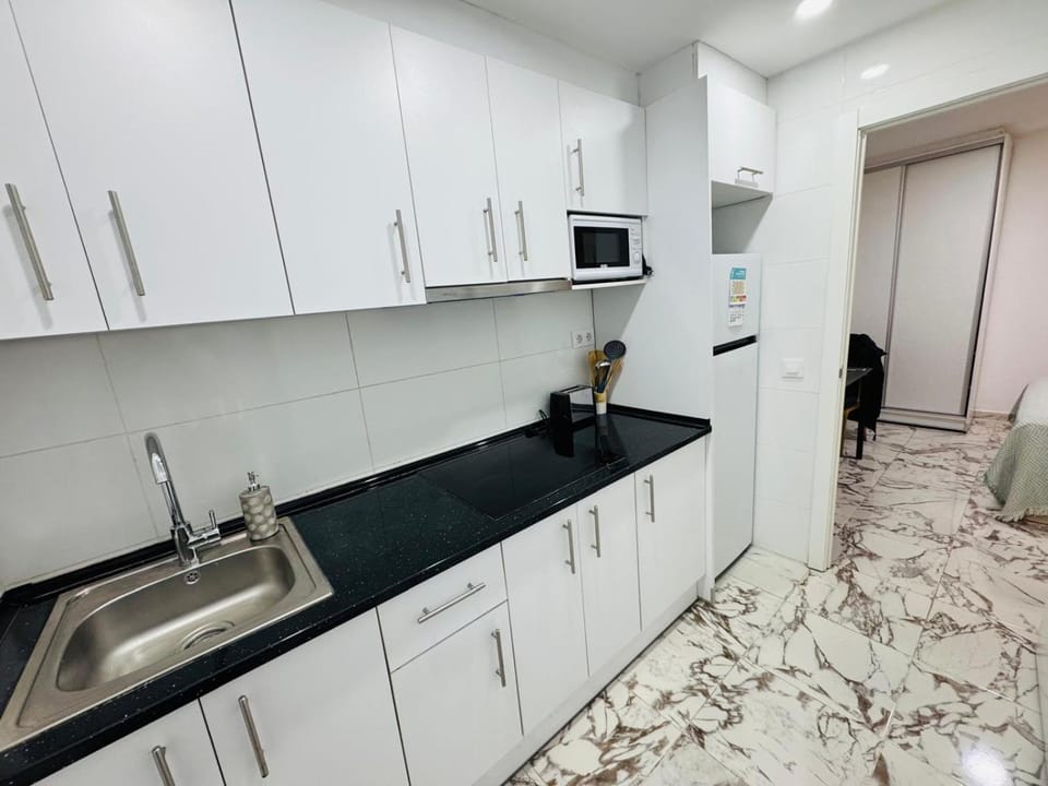 Kitchen or kitchenette, stove