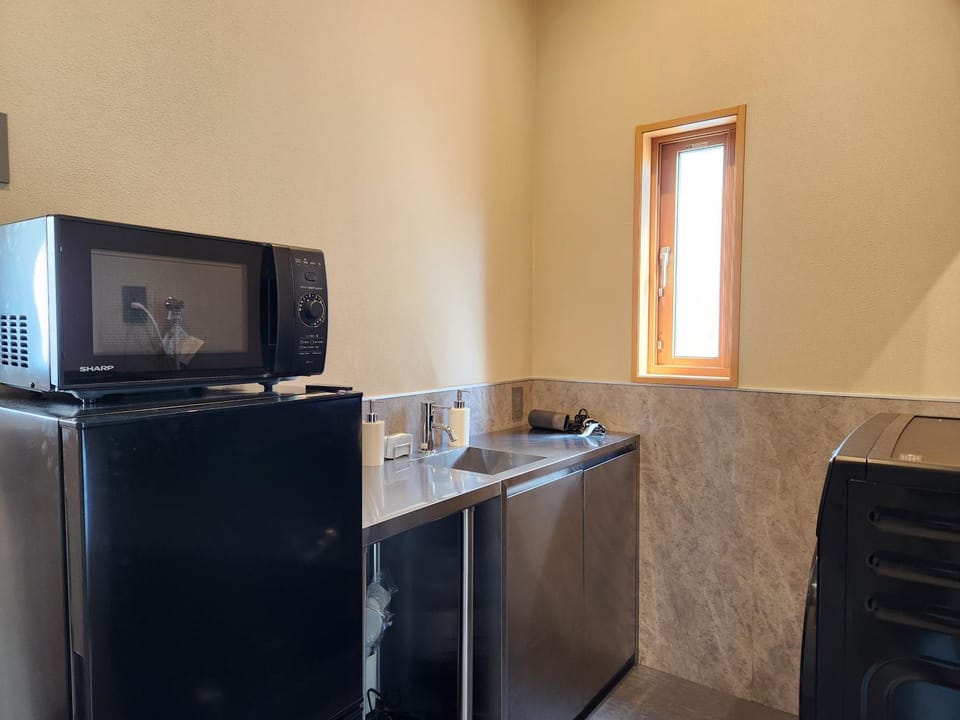 Kitchen or kitchenette, microwave