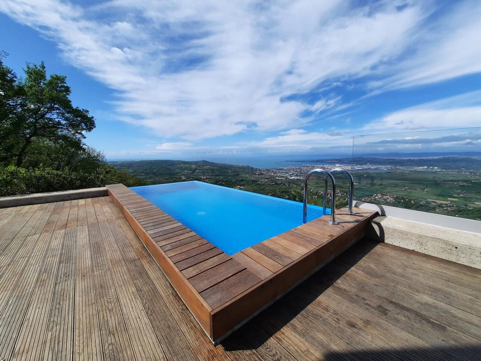 View (from property/room), Balcony/Terrace, City view, Mountain view, Pool view, Swimming pool