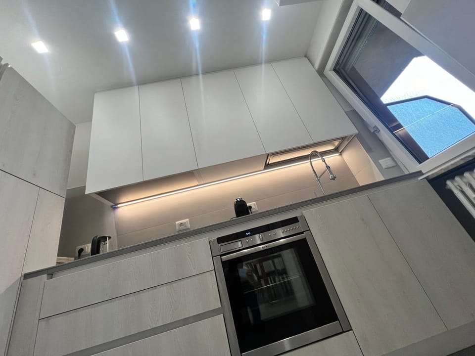 Kitchen or kitchenette, stove