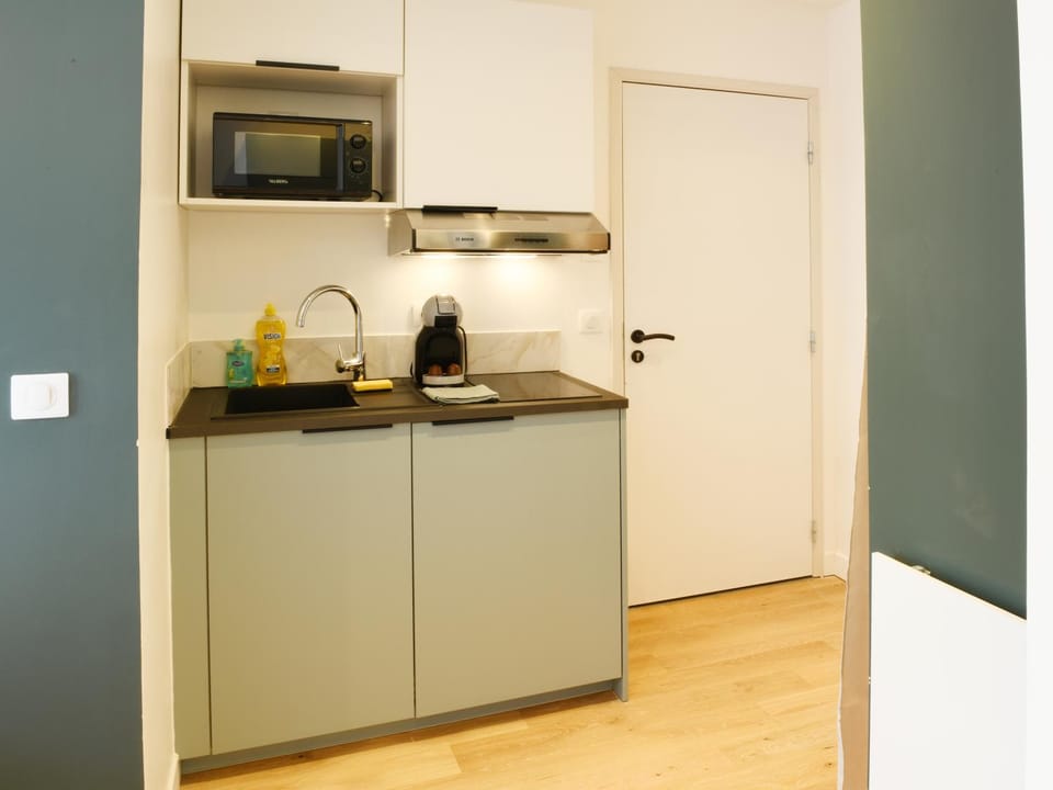 Kitchen or kitchenette, stove
