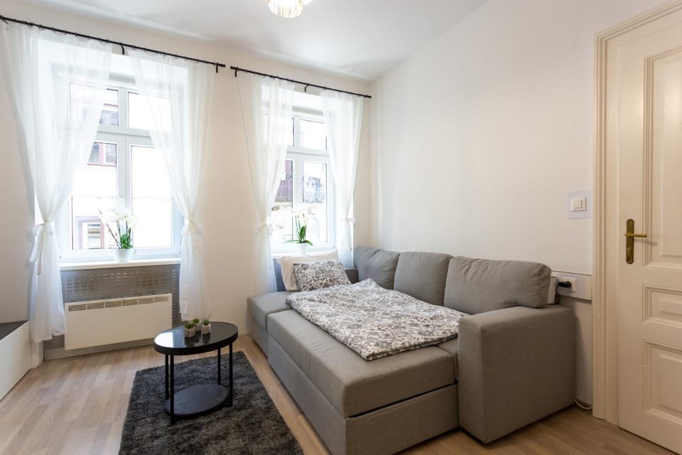 Bed, Living room, Seating area, Bedroom