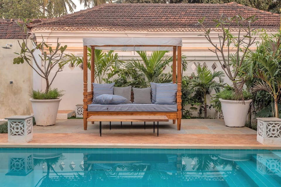 Property building, Patio, Spring, Day, Garden, Living room, Seating area, Garden view, Pool view, Swimming pool, sunbed