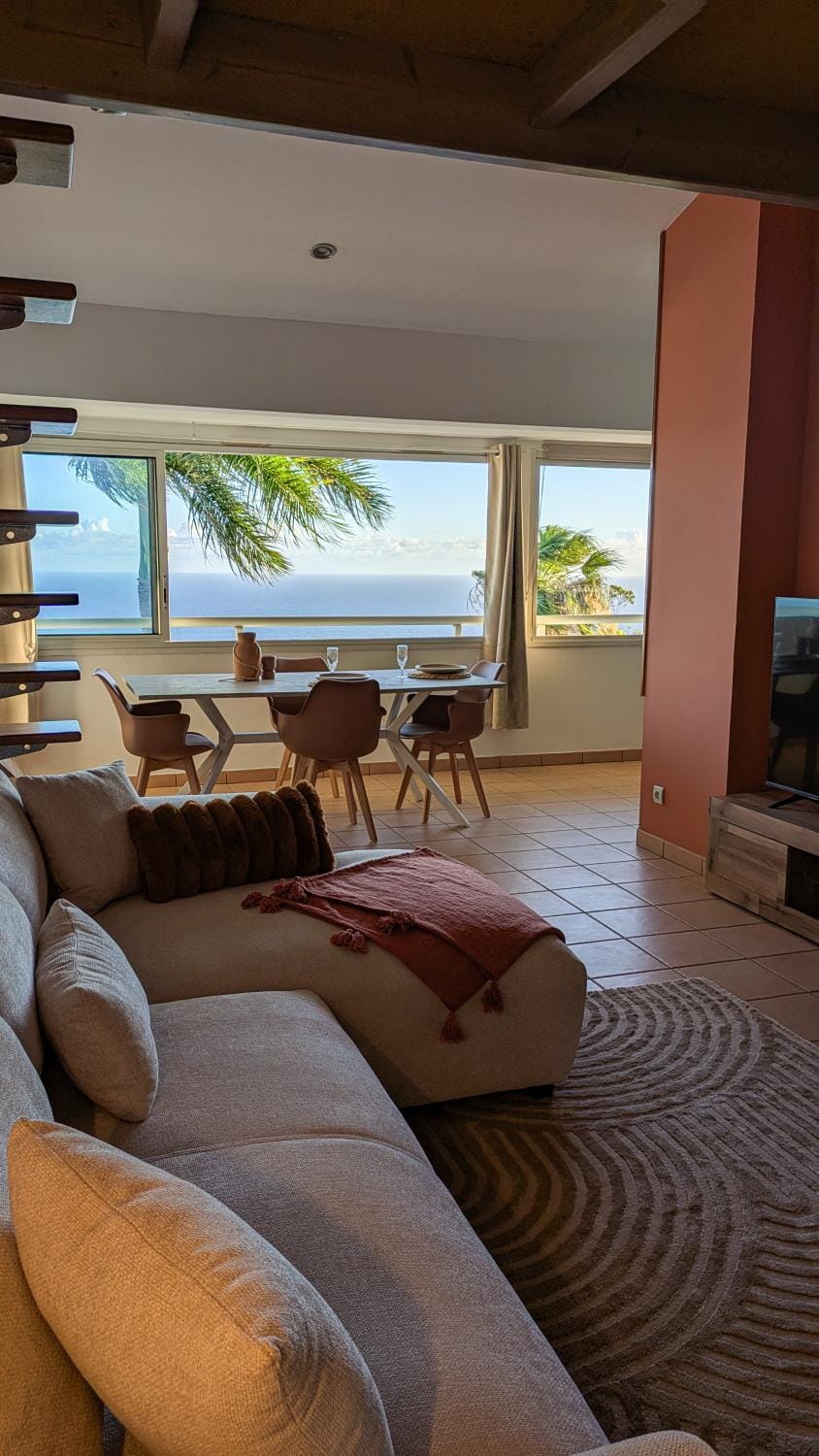Natural landscape, Living room, Seating area, Dining area, Sea view