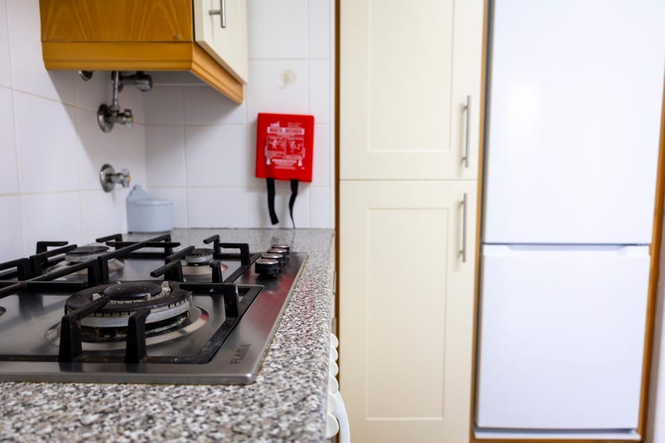 Kitchen or kitchenette, stove