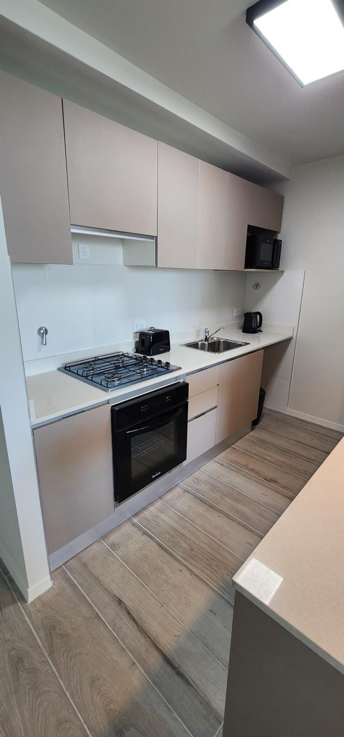 Kitchen or kitchenette, stove