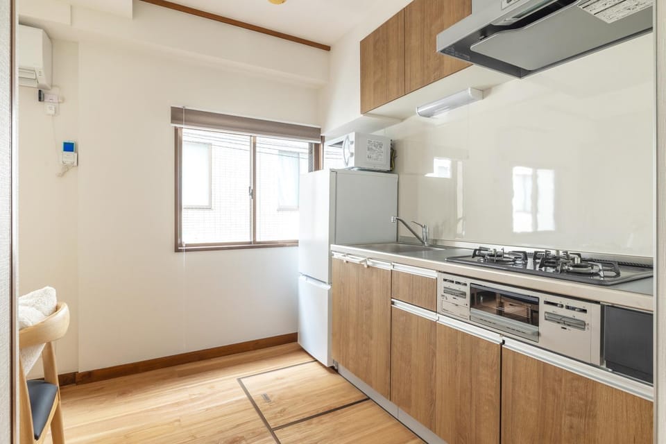 Home suite Home Ryogoku - Perfect for Families and Groups, Spacious 197m2 Home with 8 BR & 3 BA, Up to 15 ppl with Parking and 3 Stations Villa in Japan