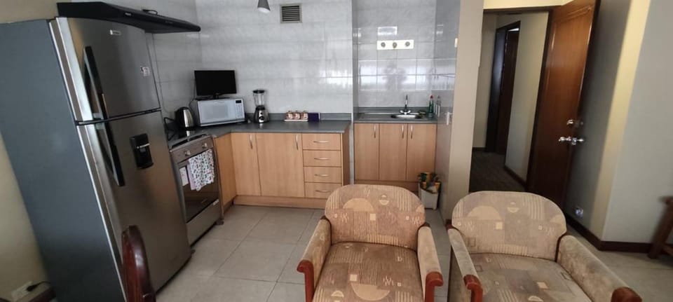 Kitchen or kitchenette, oven, stove