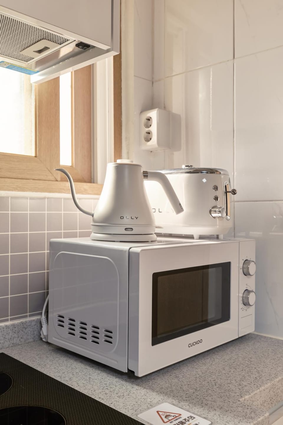 Kitchen or kitchenette, microwave, toaster