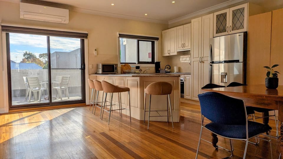 Kitchen or kitchenette, Living room, Dining area, oven, stove, air conditioner