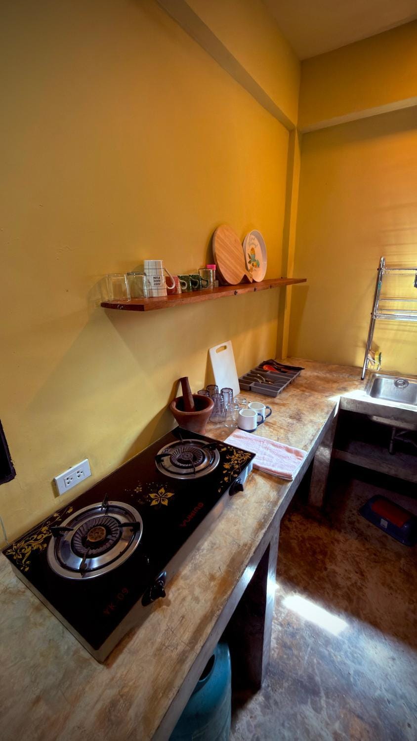 Kitchen or kitchenette, stove
