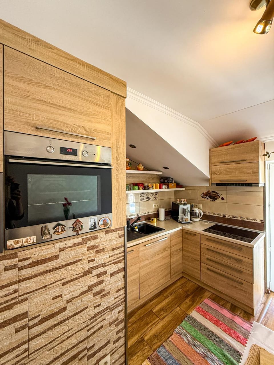 Kitchen or kitchenette, oven