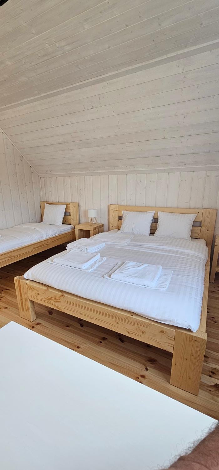 Domy pod lasem BANIA-SAUNA House in Pomeranian Voivodeship