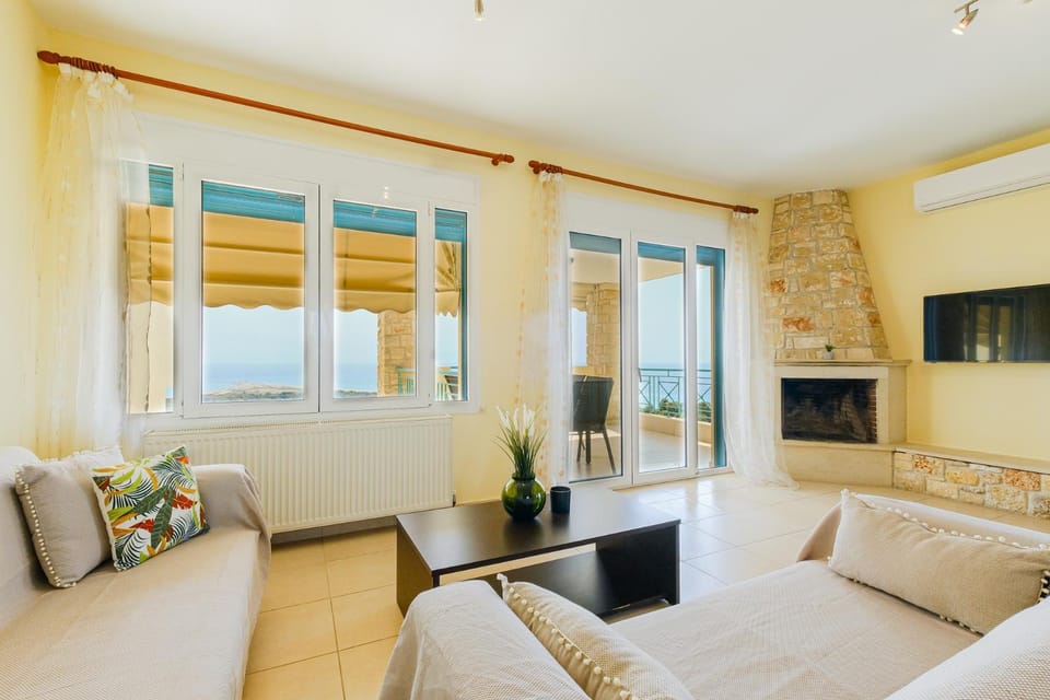 TV and multimedia, Living room, Seating area, fireplace, air conditioner