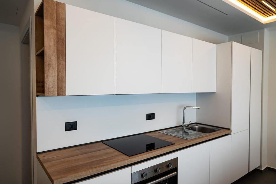 Kitchen or kitchenette, stove