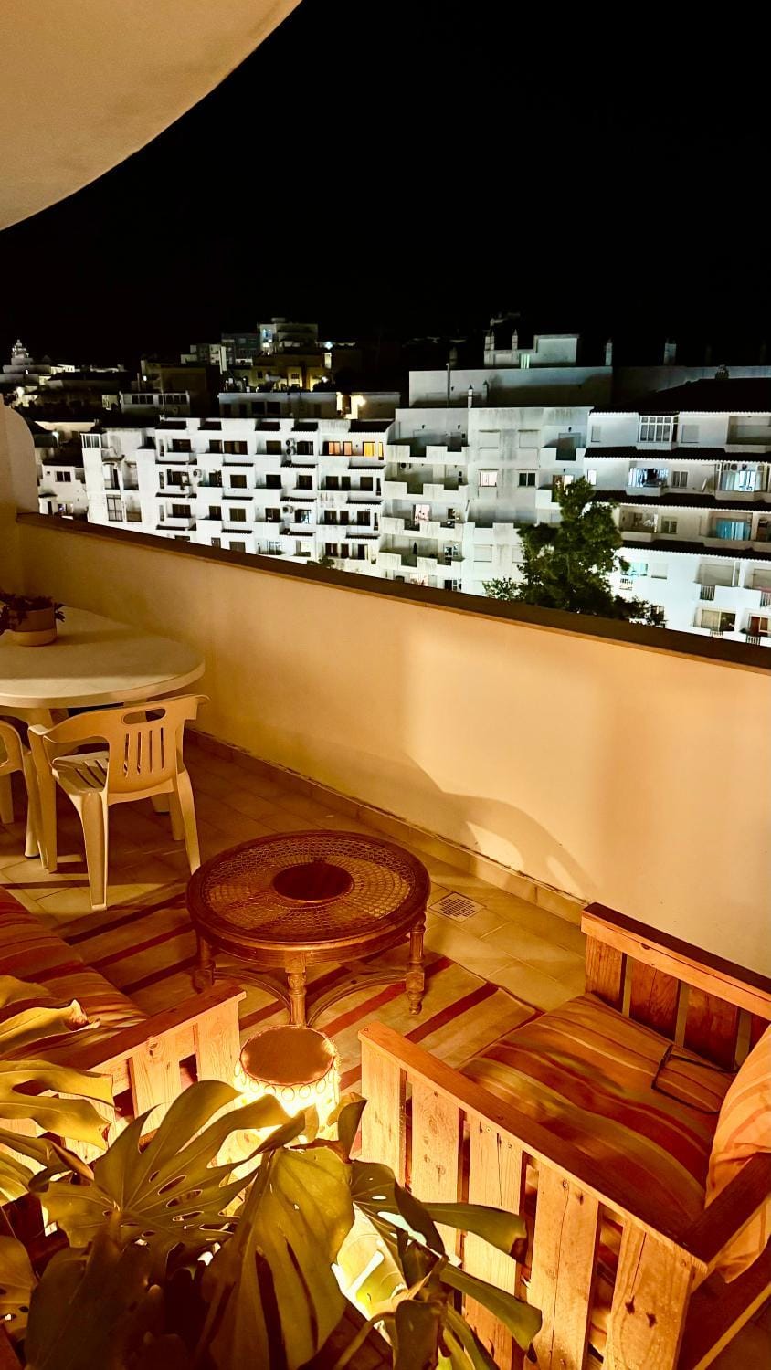 Property building, Patio, Night, Balcony/Terrace, Seating area