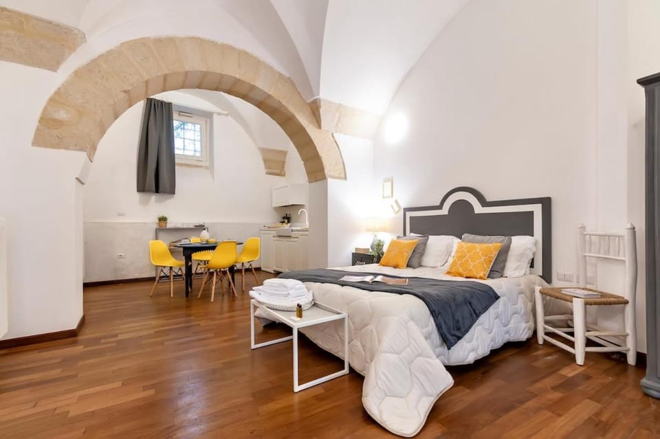 Bed, Living room, Seating area, Bedroom