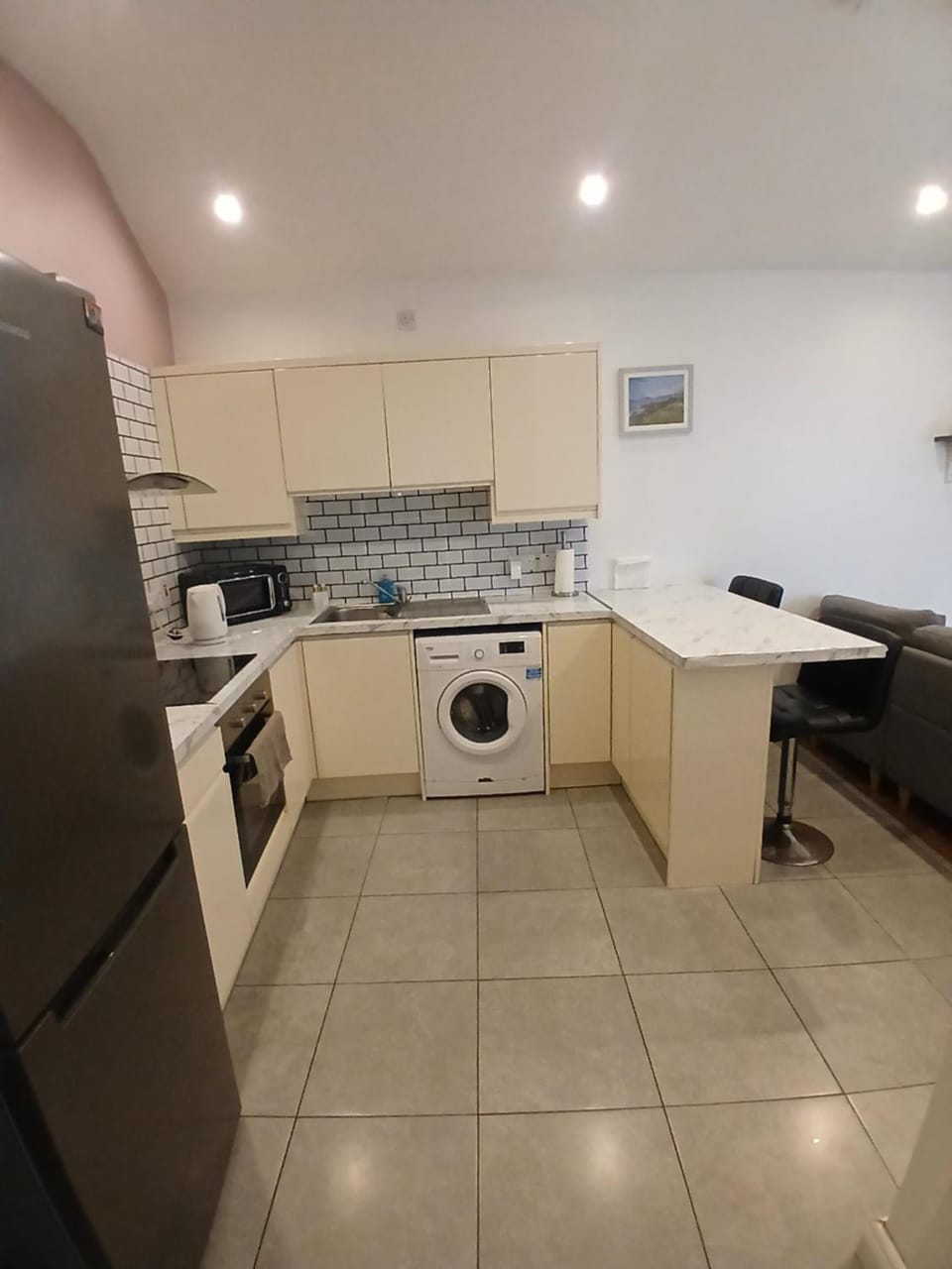 Kitchen or kitchenette, oven, stove, washing machine