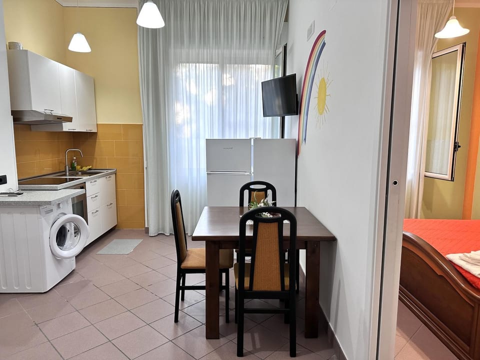 Kitchen or kitchenette, Living room, Dining area, oven, stove, washing machine