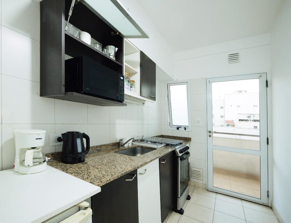 Kitchen or kitchenette, oven, toaster
