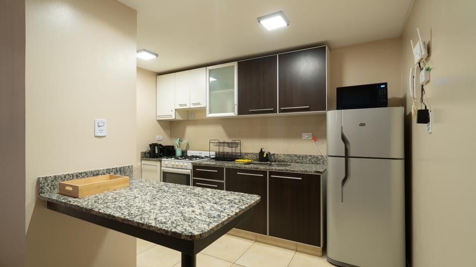 Kitchen or kitchenette, oven, stove, toaster