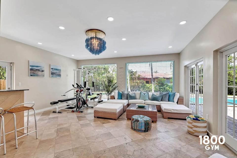 Living room, Seating area, Pool view